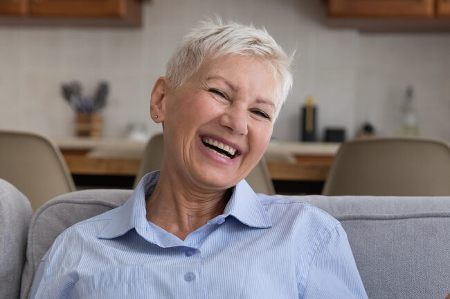 Positive Old Lady With Stylish Short Hairdo Laugh On Joke